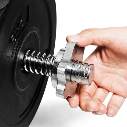 Hand using a metal tool on a wheel, likely for maintenance or repair.