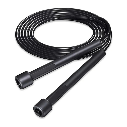 Black jump rope coiled on a white background