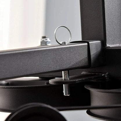 Close-up of a mechanical component with a metallic finish on a blurred background