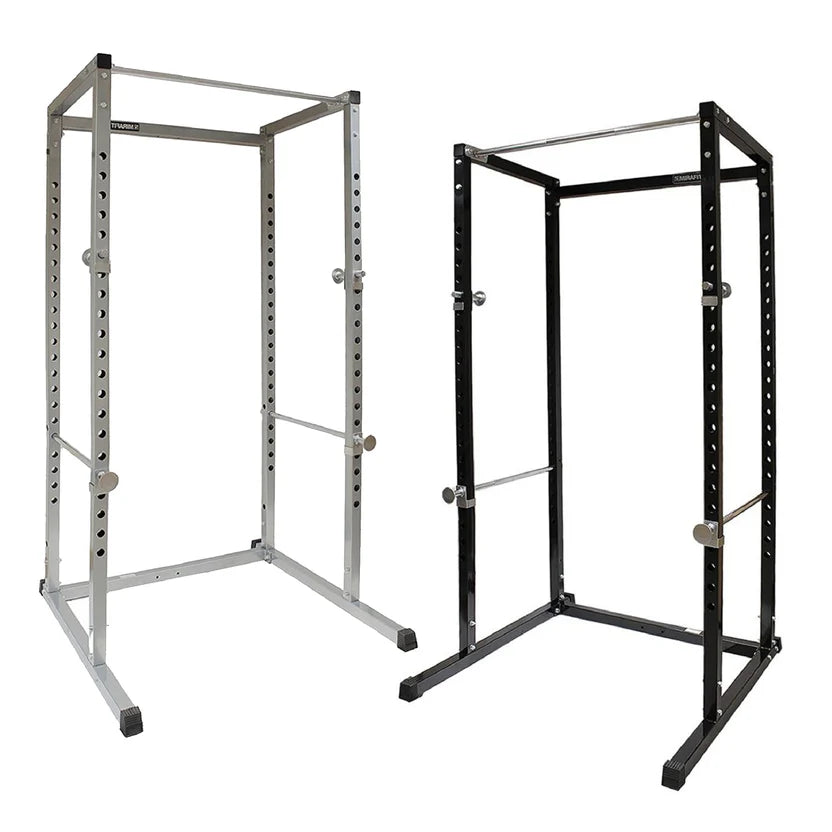 Two metal power rack frames, one silver and one black, on a white background.
