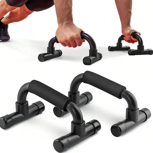 Black push-up bars on a white background with a person using them.